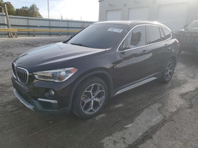 BMW X1 XDRIVE2 2017 with VIN WBXHT3C39H5F70018 - Photo from auction