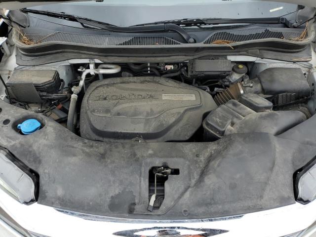 Photo 12 from auction – 2021 HONDA PILOT EX with VIN 5FNYF5H31MB002943