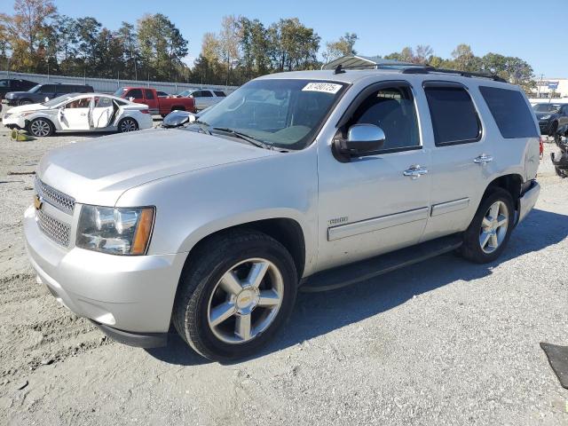 CHEVROLET TAHOE C150 2011 with VIN 1GNSCAE08BR322163 - Photo from auction
