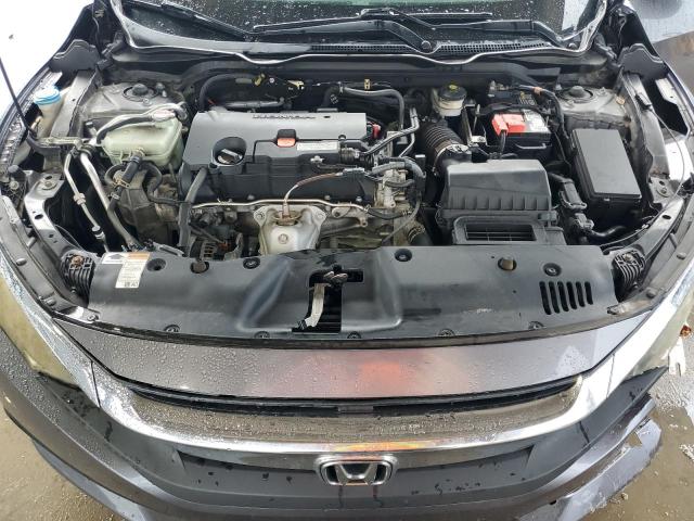 Photo 11 from auction – 2018 HONDA CIVIC EX with VIN 19XFC2F73JE032225