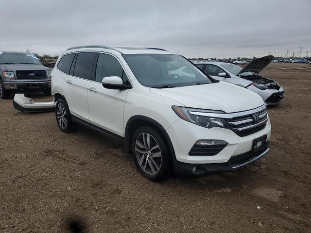 Photo 4 from auction – 2018 HONDA PILOT ELIT with VIN 5FNYF6H02JB014140