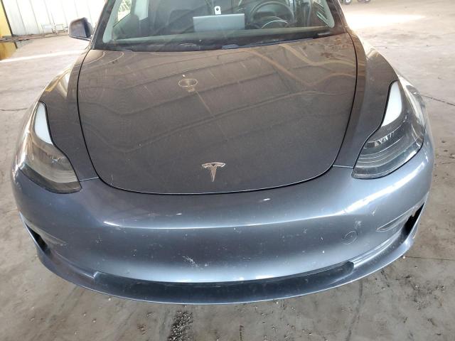 Photo 11 from auction – 2021 TESLA MODEL 3 with VIN 5YJ3E1EB3MF939150