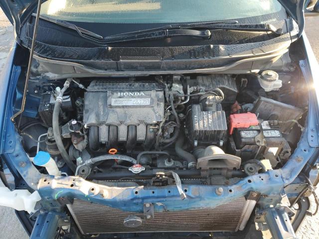 Photo 11 from auction – 2014 HONDA INSIGHT LX with VIN JHMZE2H56ES002057