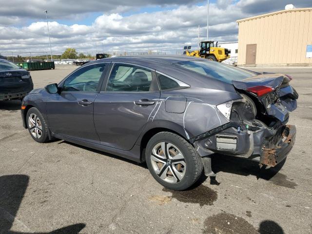 Photo 2 from auction – 2016 HONDA CIVIC LX with VIN 19XFC2F59GE004128