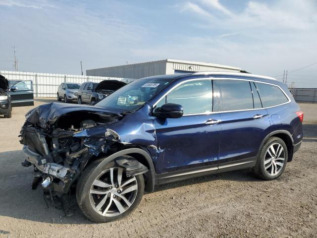 HONDA PILOT ELIT 2018 with VIN 5FNYF6H03JB011280 - Photo from auction