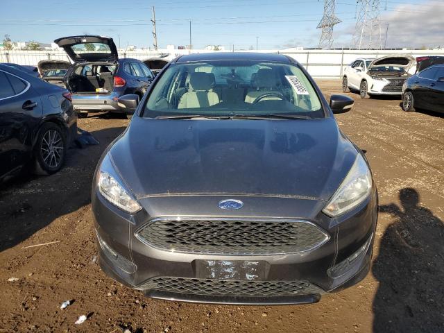 Photo 5 from auction – 2015 FORD FOCUS SE with VIN 1FADP3F23FL334429