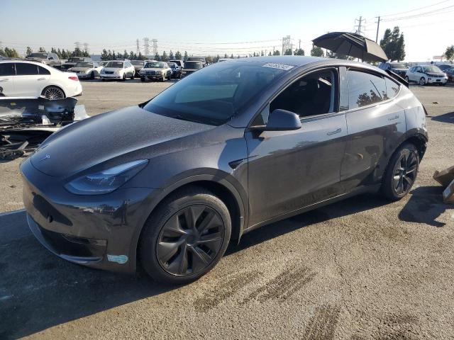 TESLA MODEL Y 2025 with VIN 7SAYGDED8SF317193 - Photo from auction