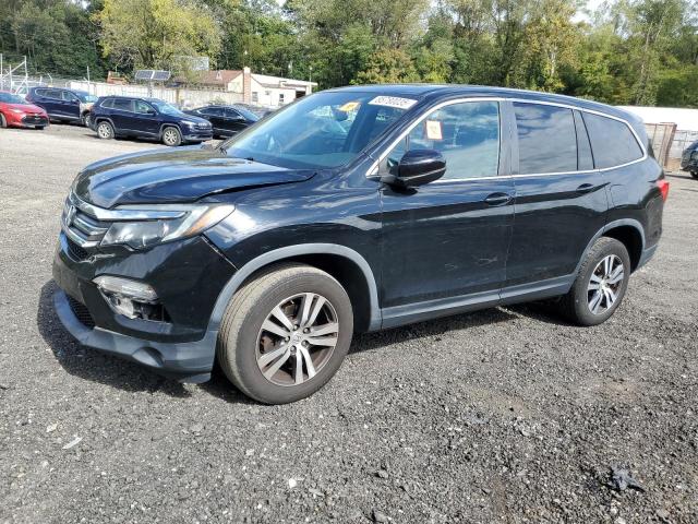 HONDA PILOT EXL 2017 with VIN 5FNYF6H57HB045857 - Photo from auction