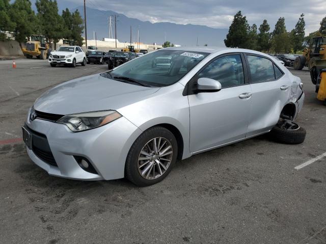 TOYOTA COROLLA L 2014 with VIN 5YFBURHE2EP112474 - Photo from auction