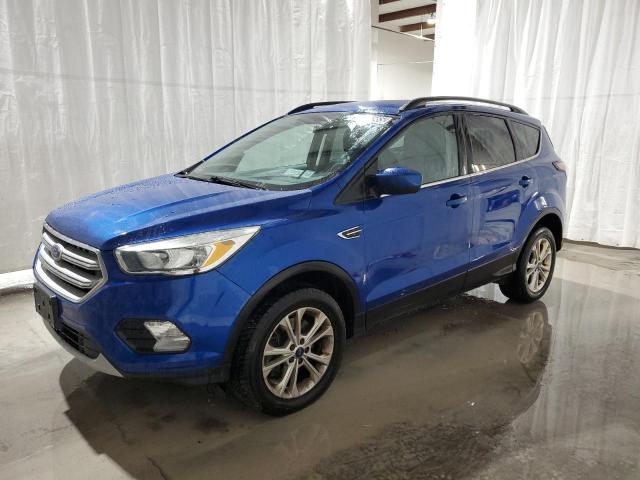 FORD ESCAPE SE 2018 with VIN 1FMCU9GD8JUA61908 - Photo from auction