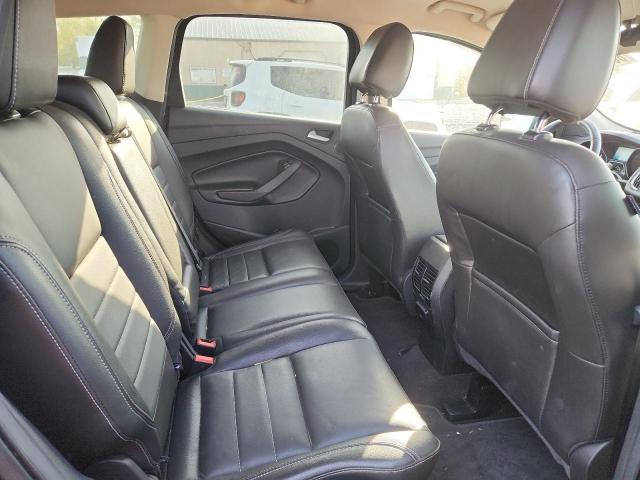 Photo 11 from auction – 2016 FORD ESCAPE TIT with VIN 1FMCU9J96GUA36583