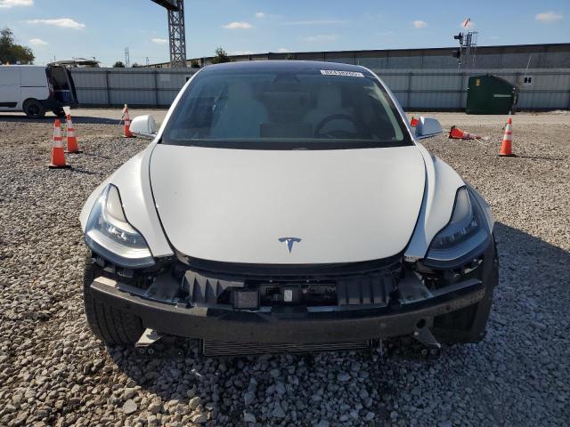 Photo 5 from auction – 2018 TESLA MODEL 3 with VIN 5YJ3E1EB3JF101289