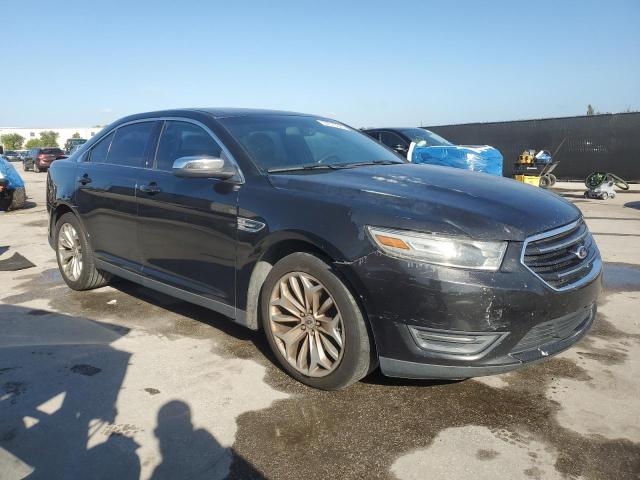 Photo 4 from auction – 2014 FORD TAURUS LIM with VIN 1FAHP2F8XEG134946
