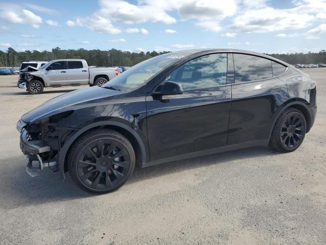 TESLA MODEL Y 2023 with VIN 7SAYGAEE8PF959654 - Photo from auction