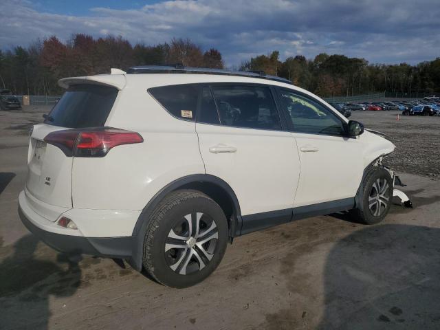 Photo 3 from auction – 2017 TOYOTA RAV4 LE with VIN JTMBFREV8HJ127228