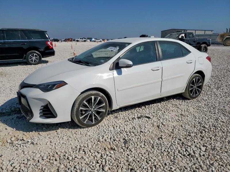TOYOTA COROLLA L 2018 with VIN 5YFBURHE1JP754484 - Photo from auction