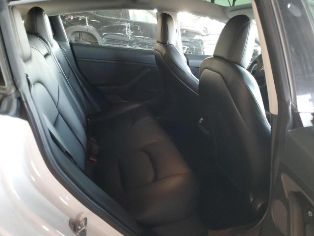 Photo 10 from auction – 2021 TESLA MODEL 3 with VIN 5YJ3E1EA4MF994813