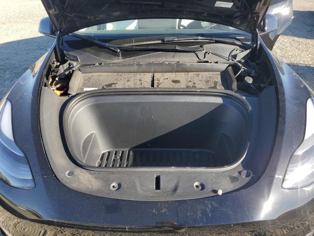 Photo 12 from auction – 2023 TESLA MODEL Y with VIN 7SAYGAEE8PF873194