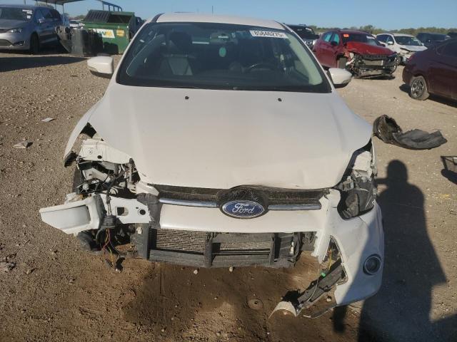Photo 5 from auction – 2014 FORD FOCUS TITA with VIN 1FADP3J20EL286717