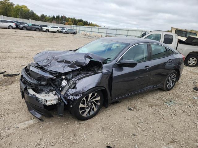Photo 1 from auction – 2018 HONDA CIVIC EX with VIN 19XFC2F76JE034793