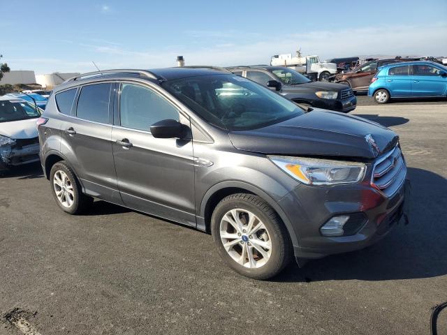 Photo 4 from auction – 2018 FORD ESCAPE with VIN 1FMCU9GD3JUA44000