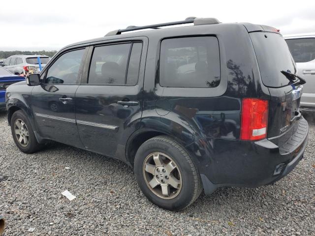 Photo 2 from auction – 2011 HONDA PILOT TOUR with VIN 5FNYF4H90BB071828