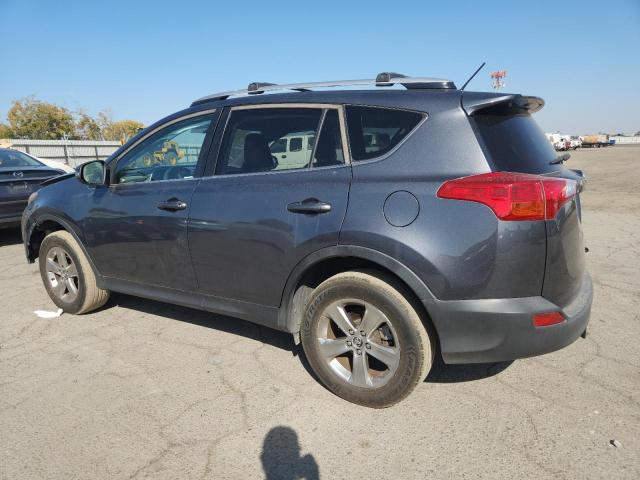 Photo 2 from auction – 2015 TOYOTA RAV4 XLE with VIN JTMRFREV0FD110921