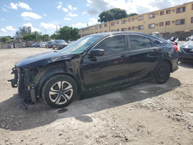 HONDA CIVIC LX 2018 with VIN 19XFC2F50JE039003 - Photo from auction