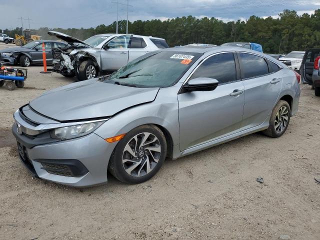 HONDA CIVIC EX 2017 with VIN 19XFC2F73HE038097 - Photo from auction