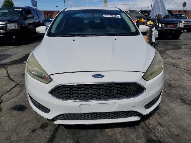Photo 5 from auction – 2016 FORD FOCUS SE with VIN 1FADP3F21GL227302