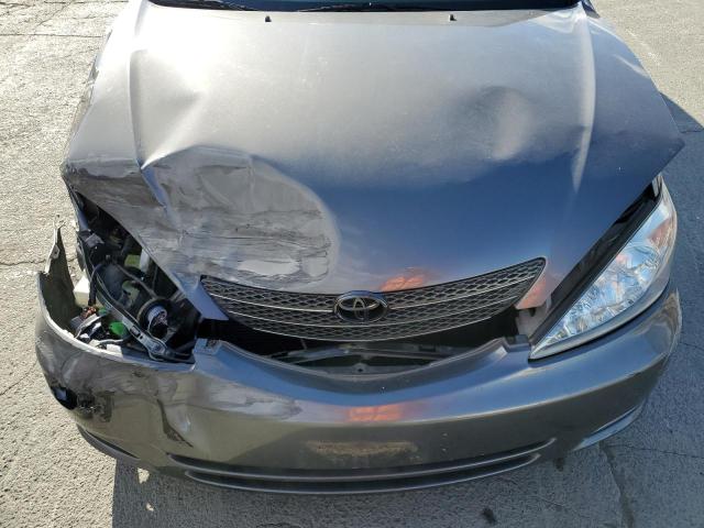 Photo 11 from auction – 2004 TOYOTA CAMRY LE with VIN 4T1BF30K24U574300