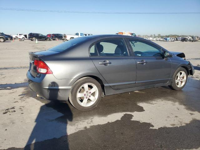 Photo 3 from auction – 2011 HONDA CIVIC LX-S with VIN 19XFA1F69BE043738