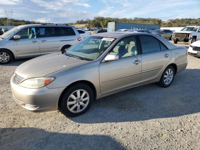 TOYOTA CAMRY LE 2002 with VIN JTDBF30KX20057402 - Photo from auction
