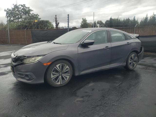 HONDA CIVIC EX 2016 with VIN 19XFC1F35GE204075 - Photo from auction