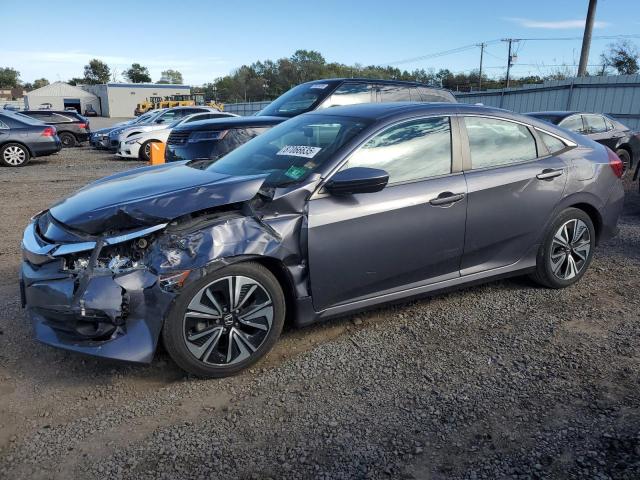 HONDA CIVIC 2016 with VIN 2HGFC1F34GH643452 - Photo from auction