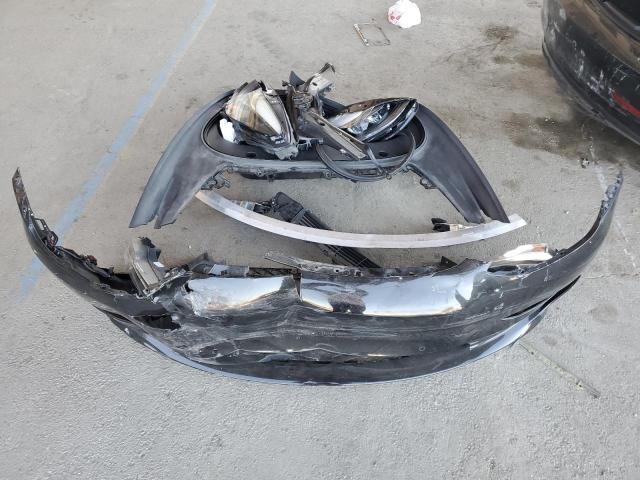 Photo 12 from auction – 2021 TESLA MODEL 3 with VIN 5YJ3E1EB9MF056363