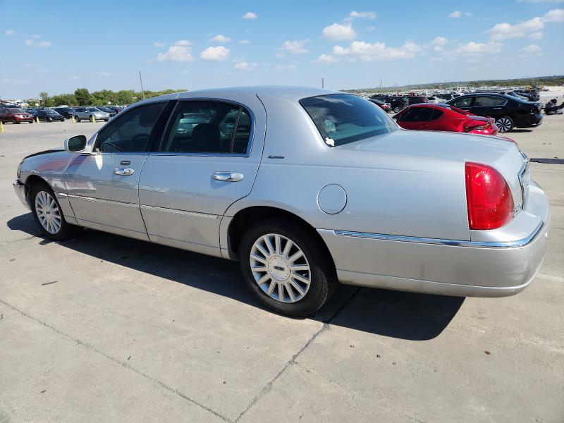 Photo 2 from auction – 2004 LINCOLN TOWN CAR E with VIN 1LNHM81W54Y606440
