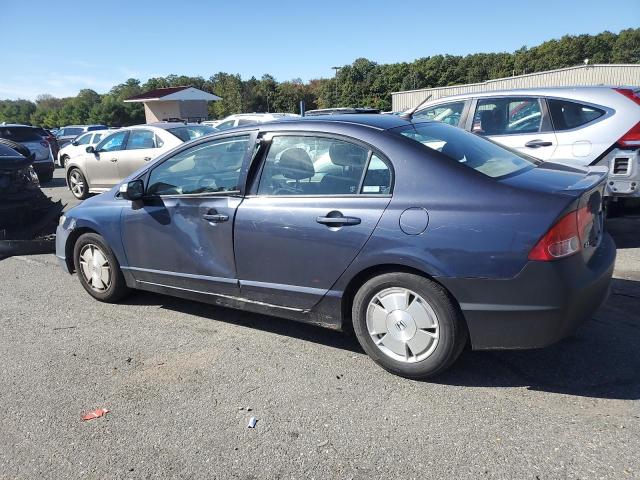 Photo 2 from auction – 2006 HONDA CIVIC HYBR with VIN JHMFA36256S014361