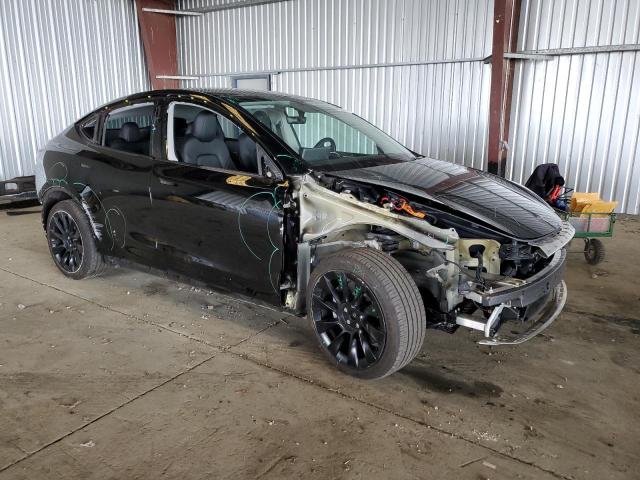 Photo 4 from auction – 2023 TESLA MODEL Y with VIN 7SAYGDEE9PF753390