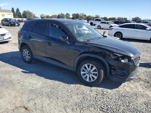 Photo 4 from auction – 2016 MAZDA CX-5 TOURING with VIN JM3KE2CY7G0838356