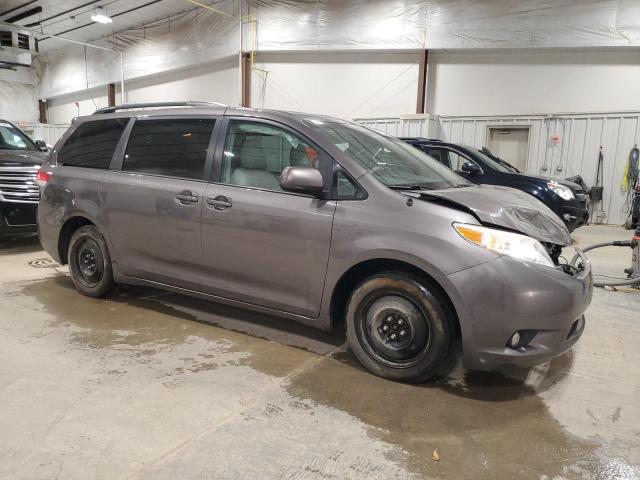 Photo 4 from auction – 2014 TOYOTA SIENNA XLE with VIN 5TDYK3DC0ES409736
