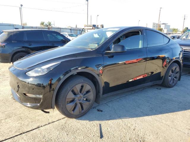 TESLA MODEL Y 2024 with VIN 7SAYGDED9RF121533 - Photo from auction