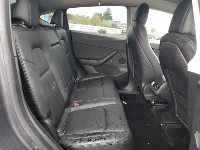 Photo 11 from auction – 2022 TESLA MODEL Y with VIN 7SAYGDEE7NF315934