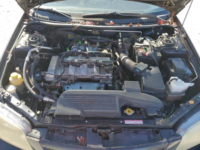 Photo 11 from auction – 2003 MAZDA PROTEGE DX with VIN JM1BJ225730164909