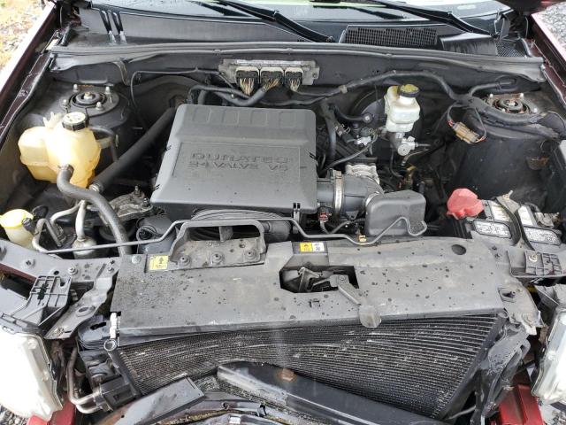 Photo 12 from auction – 2009 FORD ESCAPE LIM with VIN 1FMCU94G39KC68275