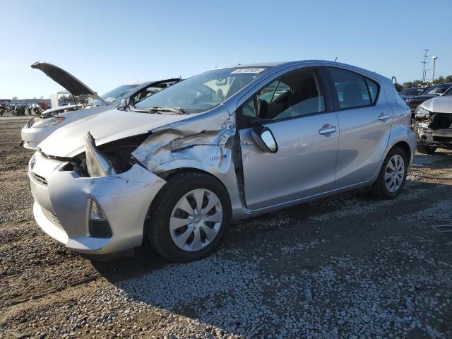 TOYOTA PRIUS C 2014 with VIN JTDKDTB39E1063816 - Photo from auction