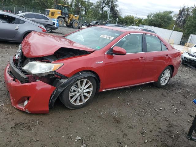 TOYOTA CAMRY HYBR 2012 with VIN 4T1BD1FK2CU007309 - Photo from auction