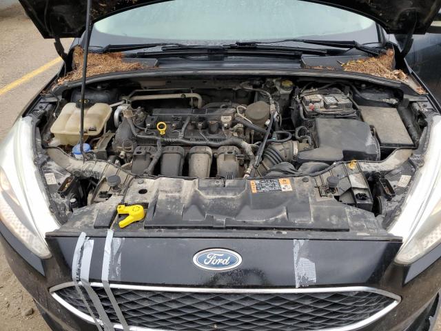 Photo 11 from auction – 2015 FORD FOCUS SE with VIN 1FADP3F22FL249789