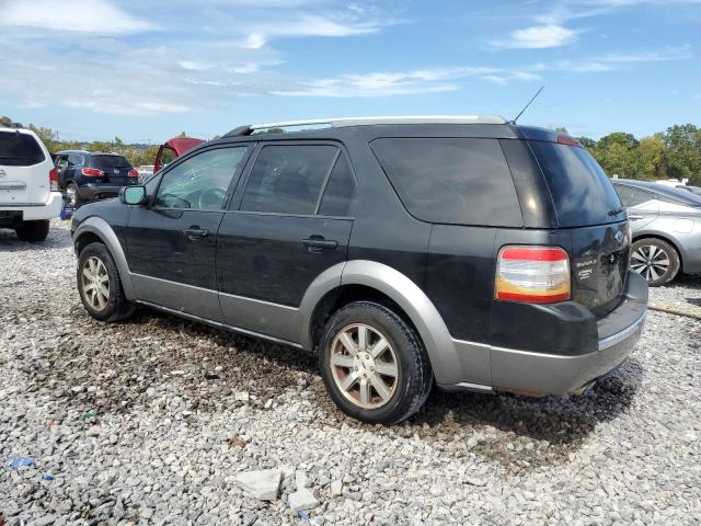 Photo 2 from auction – 2009 FORD TAURUS X with VIN 1FMDK02W29GA03382
