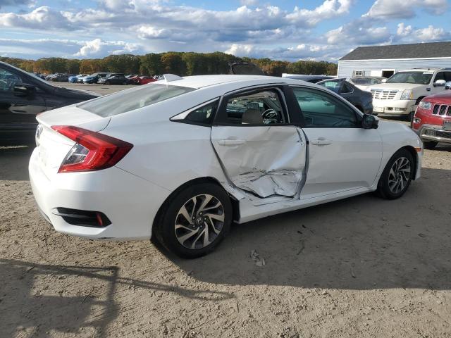 Photo 3 from auction – 2018 HONDA CIVIC EX with VIN 19XFC2F72JE207046
